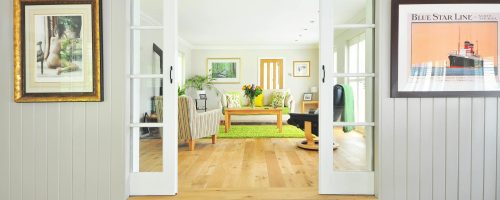 A bright and open living room showcasing contemporary interior design and luxury furnishings.